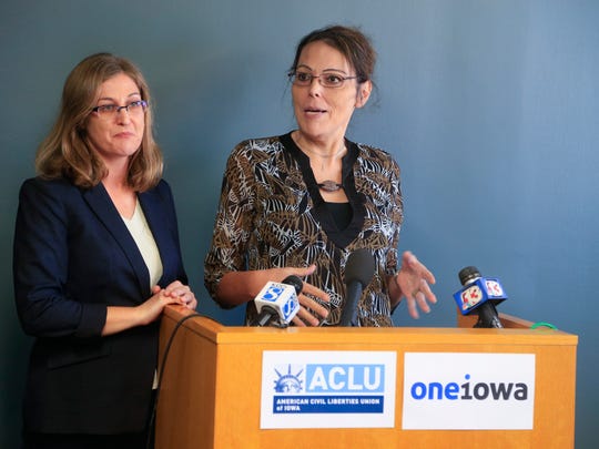 ACLU of Iowa Legal Director Rita Bettis, left, joins