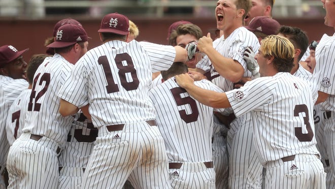 Mississippi State celebrates Elijah MacNamee’s walk-off 3-run home run to beat the Seminoles 3-2 in their NCAA Regional elimination game at Dick Howser Stadium in Tallahassee, Fla. on Saturday, June 2, 2018.