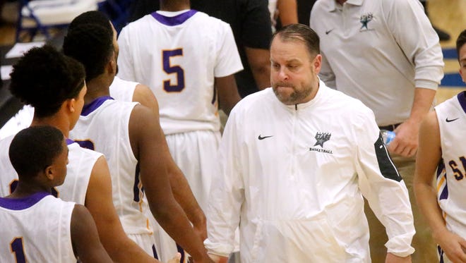 Ben Dotson, right, resigned as Siegel's boys basketball coach after eight seasons on Tuesday.