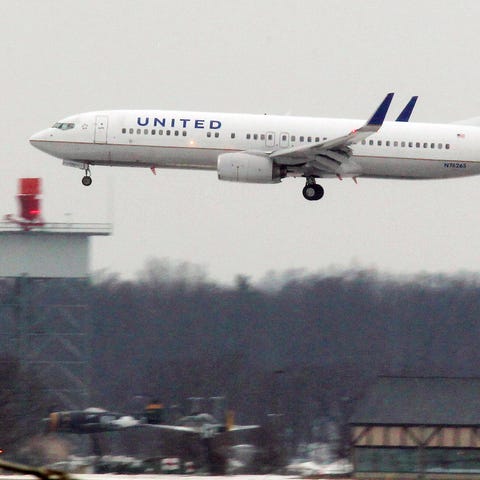 In this Feb. 1 photo, a United Airline jet...