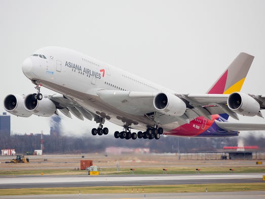 An Asiana Airlines Airbus A380 jet departs New York
