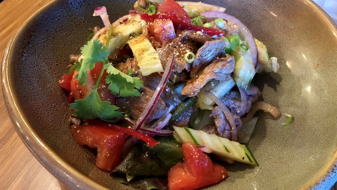 The yam neua, or spicy beef salad, from Bangkok Thai in Fort Myers is served in a chili-lime dressing with a dash of fish sauce for a salty finish.
