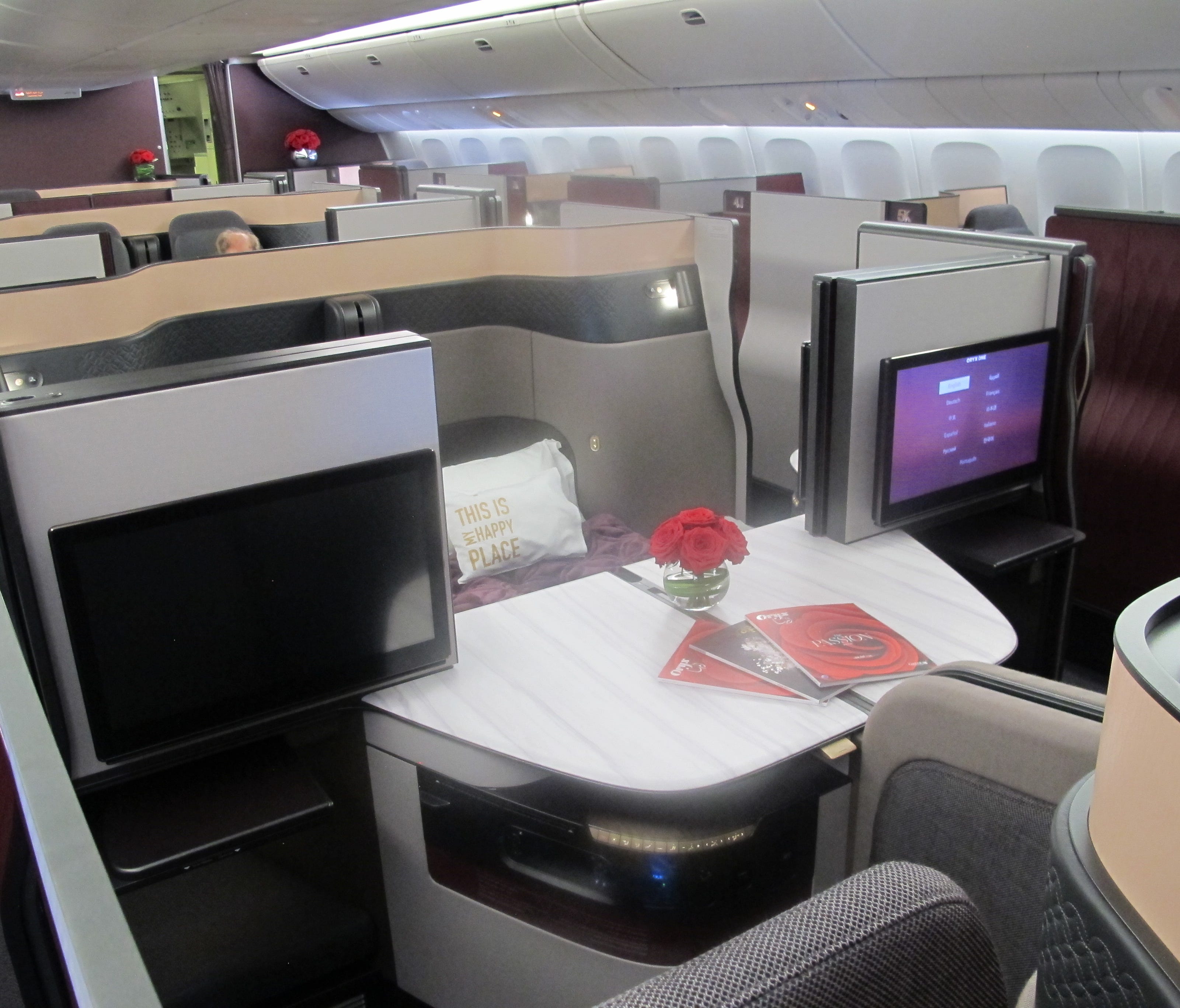Qatar Airways' new 'Qsuite' business class seats are seen on one of the airline's Boeing 777 jets at the Paris Air show on June 19, 2017.