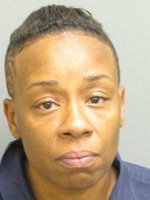 Valerie Carter is charged with Assault Second Degree - Aggravated Assault Family-Gun, attempted murder.