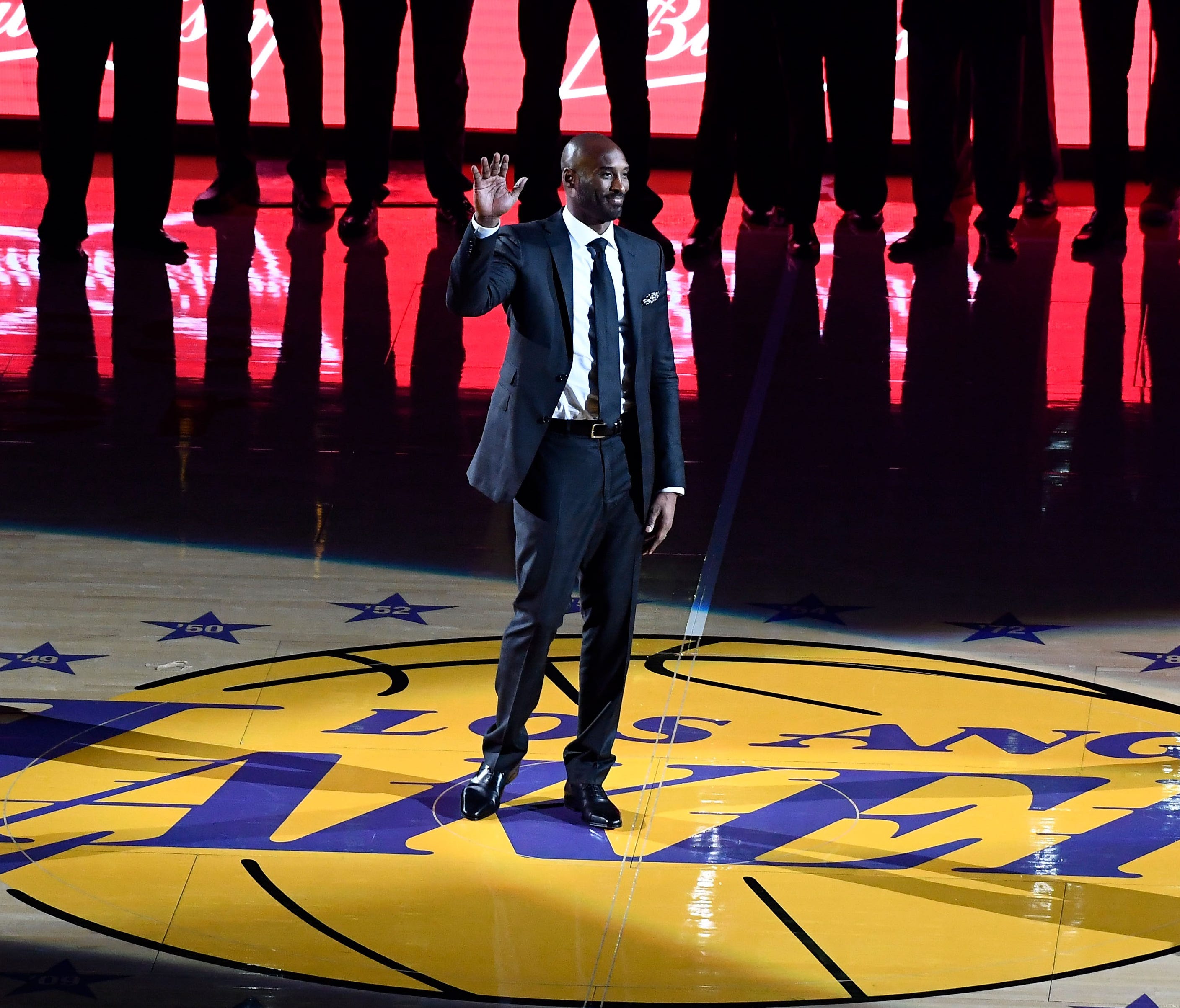 Kobe Bryant became the first Lakers player to have two numbers retired.