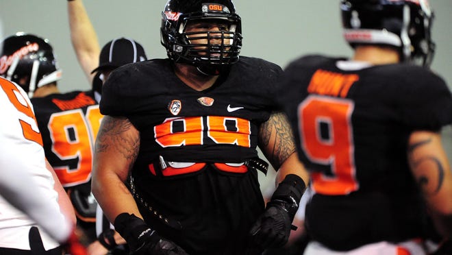 Oregon State defensive tackle Kyle Peko during a scrimmage in the Merrit Truax Indoor Practice Facillity, on Saturday, March 14, 2015, in Corvallis.