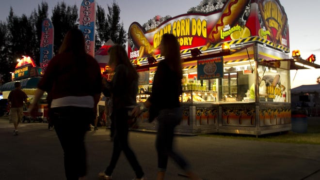 Carnival rides, games and food are part of the Coconut Festival in Cape Coral.