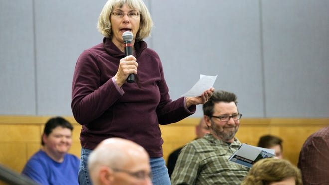 Binghamton resident Kathy Cronin speaks during a public event at SUNY Broome on Thursday where residents were encouraged to voice their concerns to local politicians.