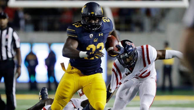 California running back Vic Enwere carries against Mississippi during the first half against Ole Miss.