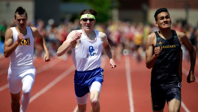 Ashwaubenon's Jose Guzman, right, narrowly beats Oak Creek's Caleb Ogden and Kettle Moraine's Ben Psicihulis to win the 400-meter dash during the finals of the WIAA state track and field meet in La Crosse on  June 4, 2016. Guzman and Psicihulis will be athletes to watch in the 400 event again this season.