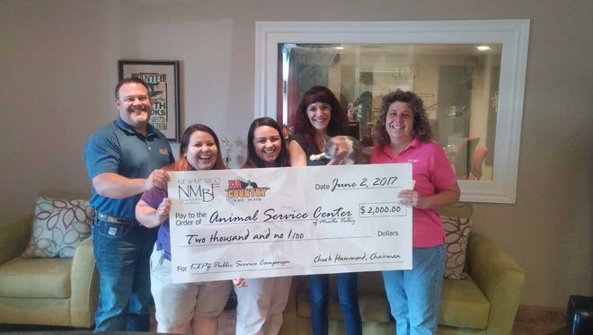 Bravo Mic Communications and the New Mexico Broadcasters Association recently donated $2,000 to the Animal Service Center of the Mesilla Valley.