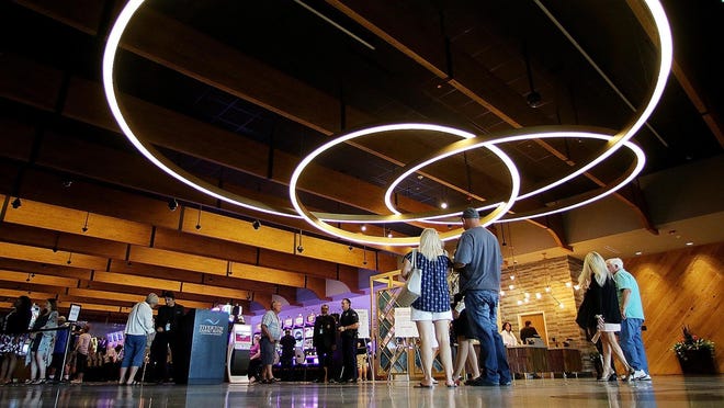 Patrons visit the Tiverton Casino shortly after it opened in 2018.