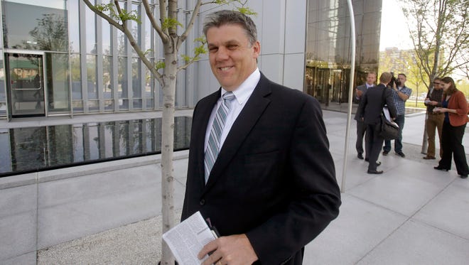 In this April 22, 2015, file photo, San Juan County Commissioner Phil Lyman leaves the federal courthouse in Salt Lake City. He will serve a 10-day sentence at Purgatory Correctional Facility.