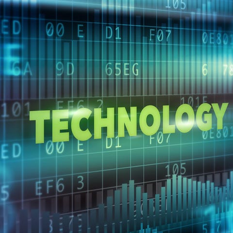 The word TECHNOLOGY on top of computer code