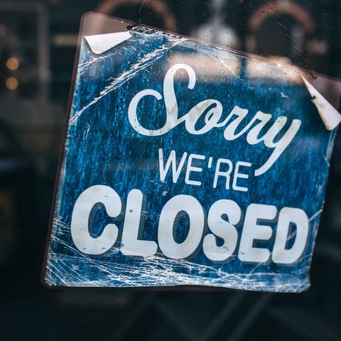 A "Sorry we're closed" sign in the window