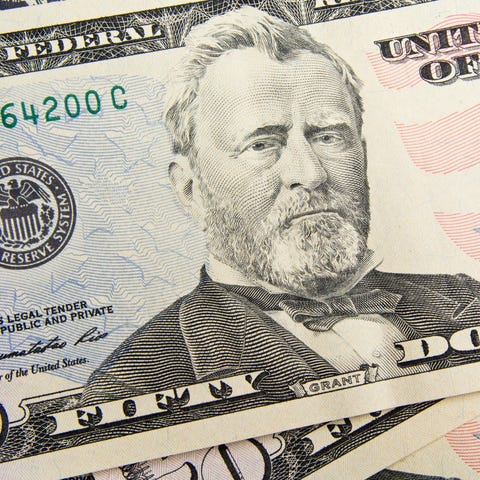 A up-close view of a fifty dollar bill.