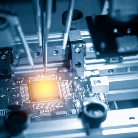 A microchip being manufactured.