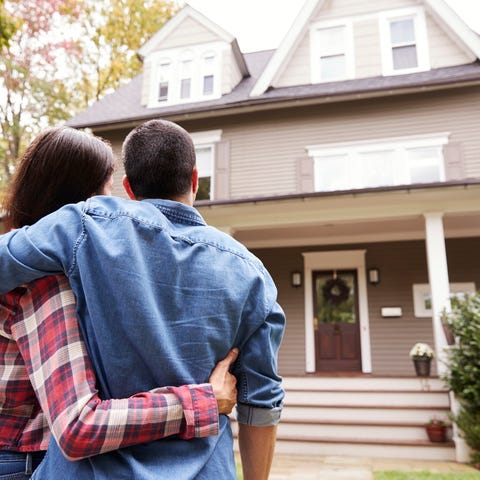 Couple looking at a home.