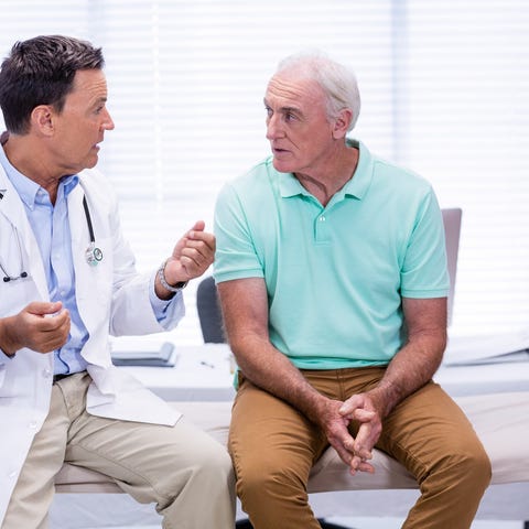 Doctor talking to patient.