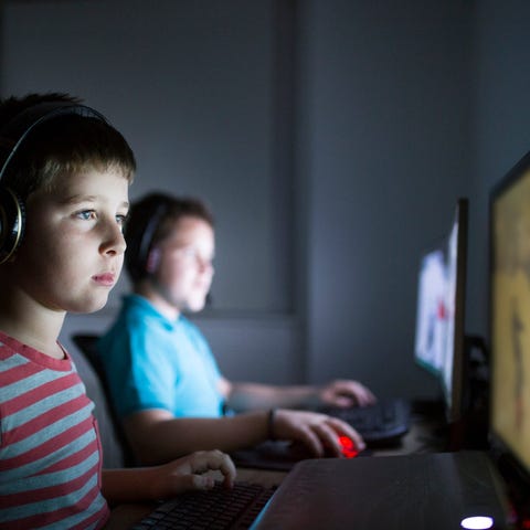 Children playing computer games.