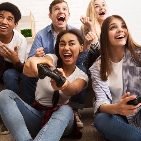 Friends playing a video game.