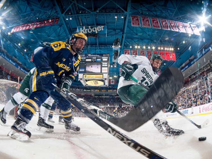 Michigan defenseman Sam Piazza and Michigan State forward