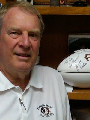 Guy Moore, owner of Garnet & Gold stores in Tallahassee, FL.   2010.
