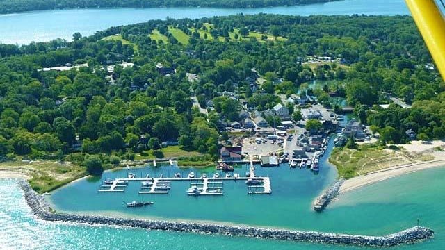 Leland is a coastal small town located on a sliver of land between Lake Michigan and Lake Leelanau, on Michigan's Leelanau Peninsula.