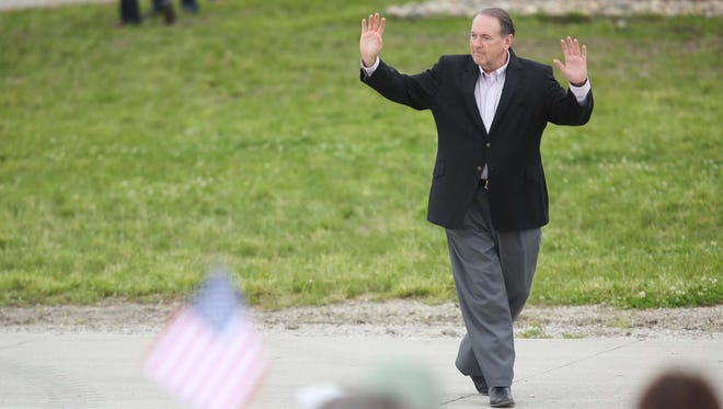 Former Governor of Arkansas Mike Huckabee makes his way to the first ever Roast and Ride, a fundraiser for Iowa senator Joni Ernst, on Saturday, June 6, 2015 at the Central Iowa Expo grounds in Boone.