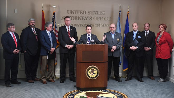 United State Attorney for the Western District of Tennessee D. Michael Dunavant is joined with law enforcement representatives during a press conference earlier this year.