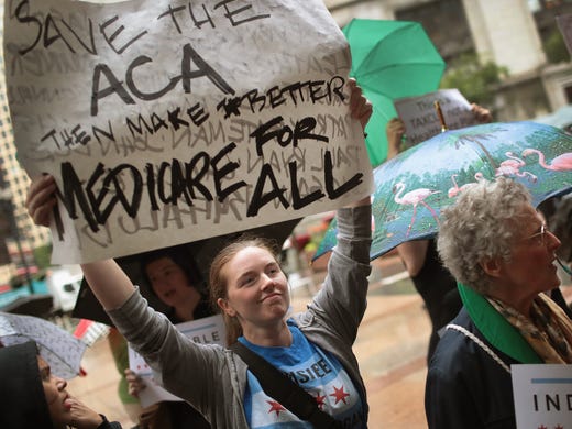 Demonstrators protest changes to the Affordable Care
