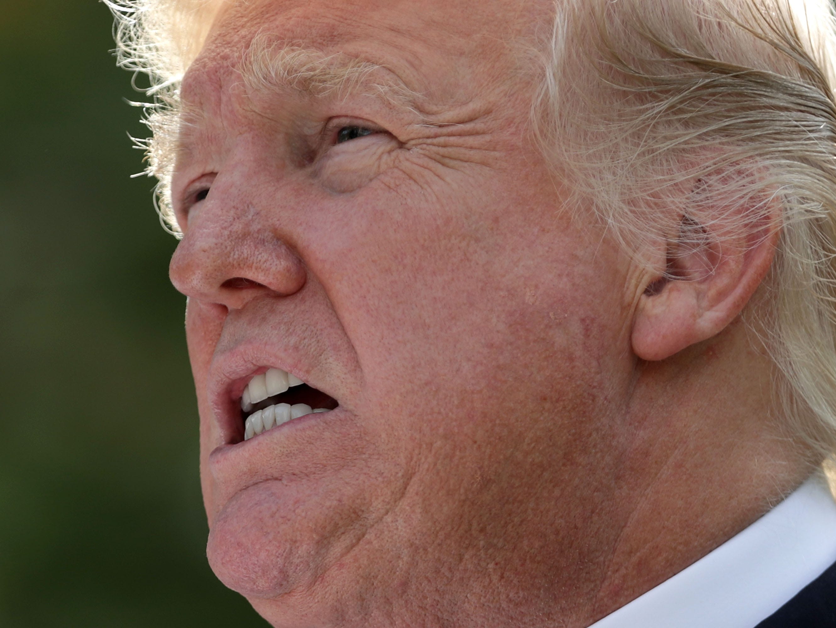 President Trump answers reporters' questions during a joint news conference with Spanish Prime Minister Mariano Rajoy in the Rose Garden at the White House Sept. 26, 2017 in Washington, D.C.