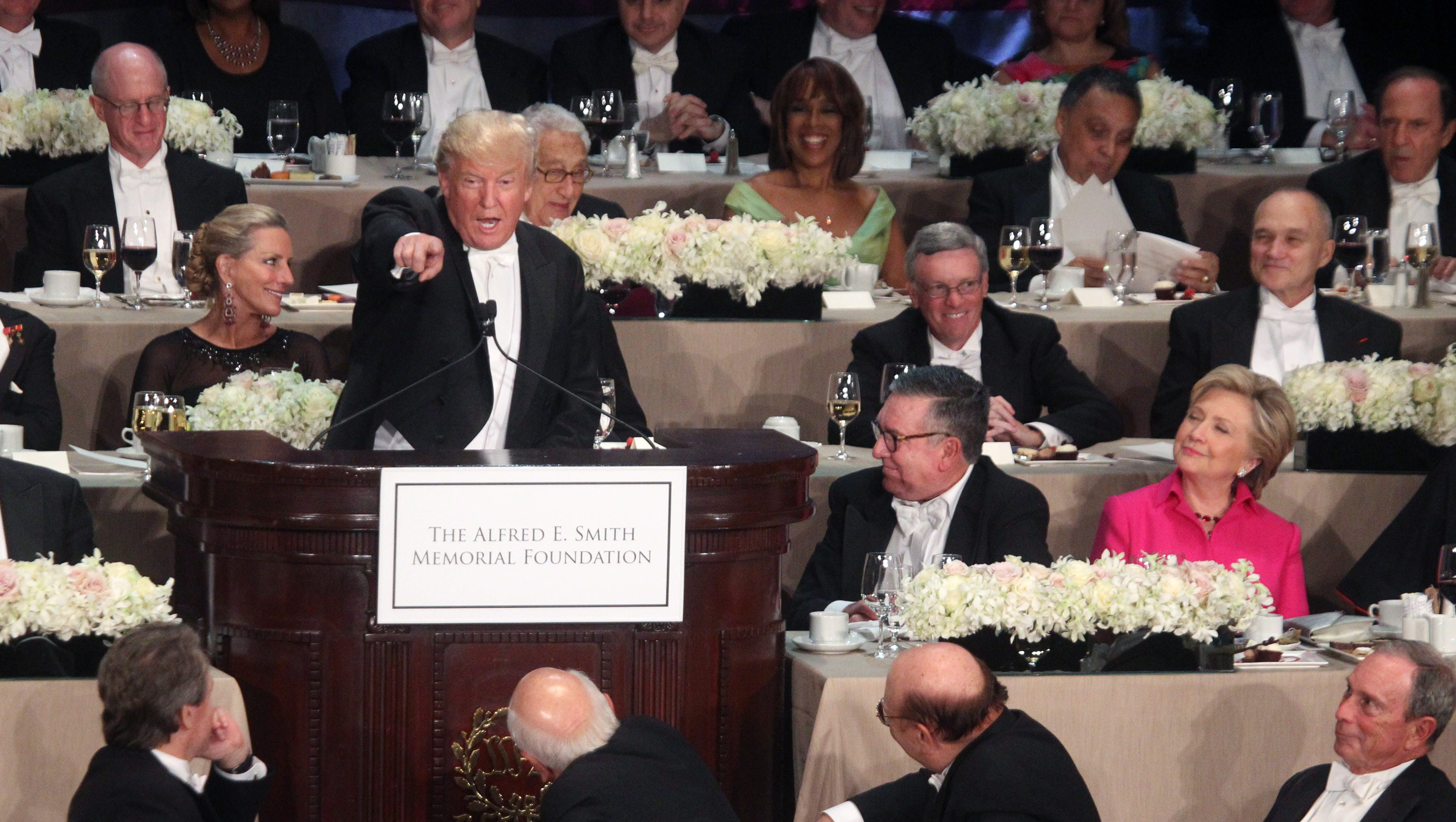Trump, Clinton try for laughs at awkward Al Smith dinner
