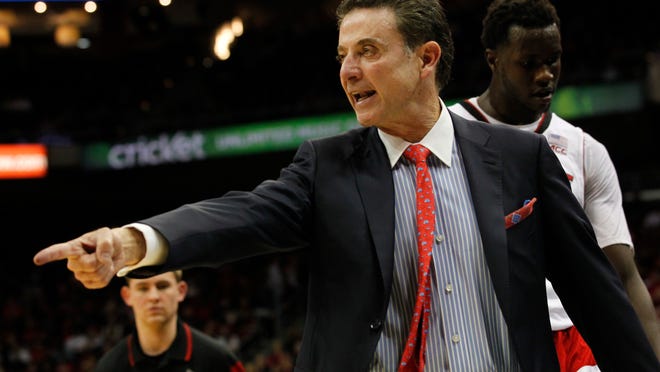 University of Louisville head coach Rick Pitino reacts to his teams play against UNC Wilmington during the second half of play at the KFC Yum! Center in Louisville, Kentucky. December 14, 2014.