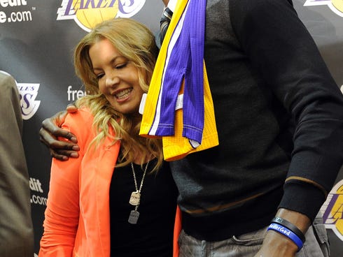 Dwight Howard hugs Jeanie Buss at his introduction as a Laker. Few expected their time together would be so short.