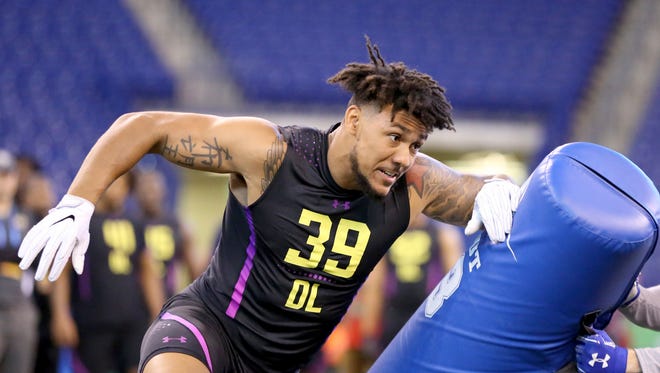 Boston College defensive lineman Harold Landry performs in a drill seen at the 2018 NFL Scouting Combine on March 4, 2018, in Indianapolis.