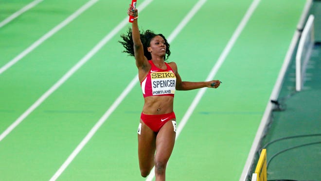 Ashley Spencer USA) win the women's 4x400m relay (3:26.38)at Oregon Convention Center.