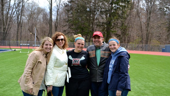 Victoria Marino of Northern Highlands (center) joined by mother Florence, father Vincent and sisters Paulina (left) and Isabella (right).