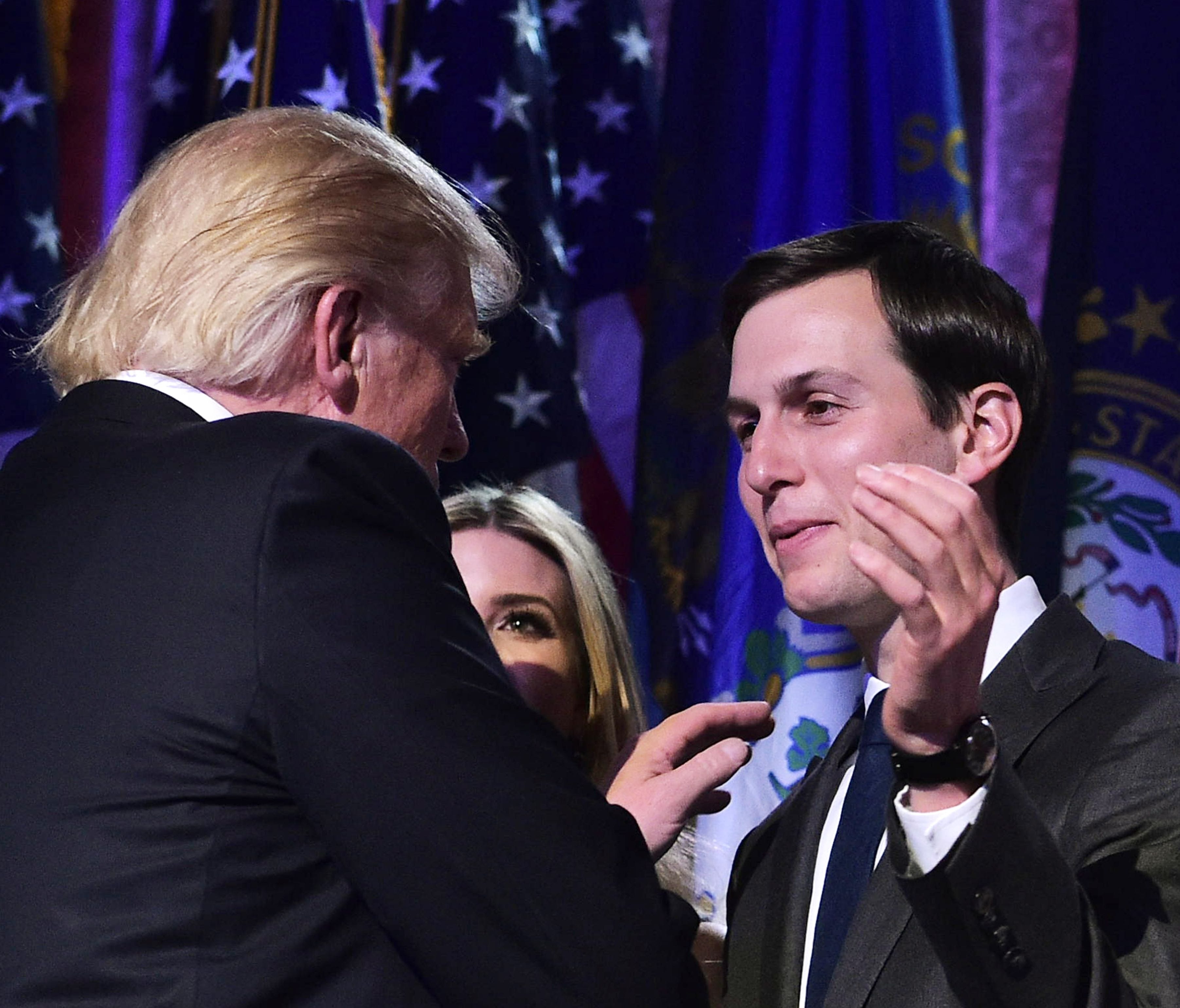 President-elect Donald Trump talks with son-in-law Jared Kushner during an election night party in New York.