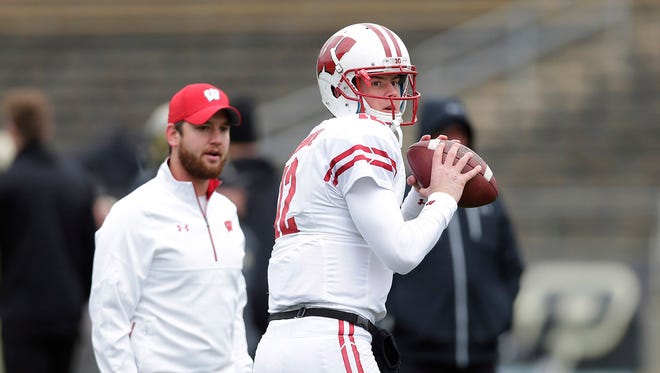 Wisconsin quarterback Alex Hornibrook warms up before a November game against Purdue in West Lafayette, Ind. UW coach Paul Chryst made it clear after the team’s first spring practice that the No. 1 job belongs to Hornibrook