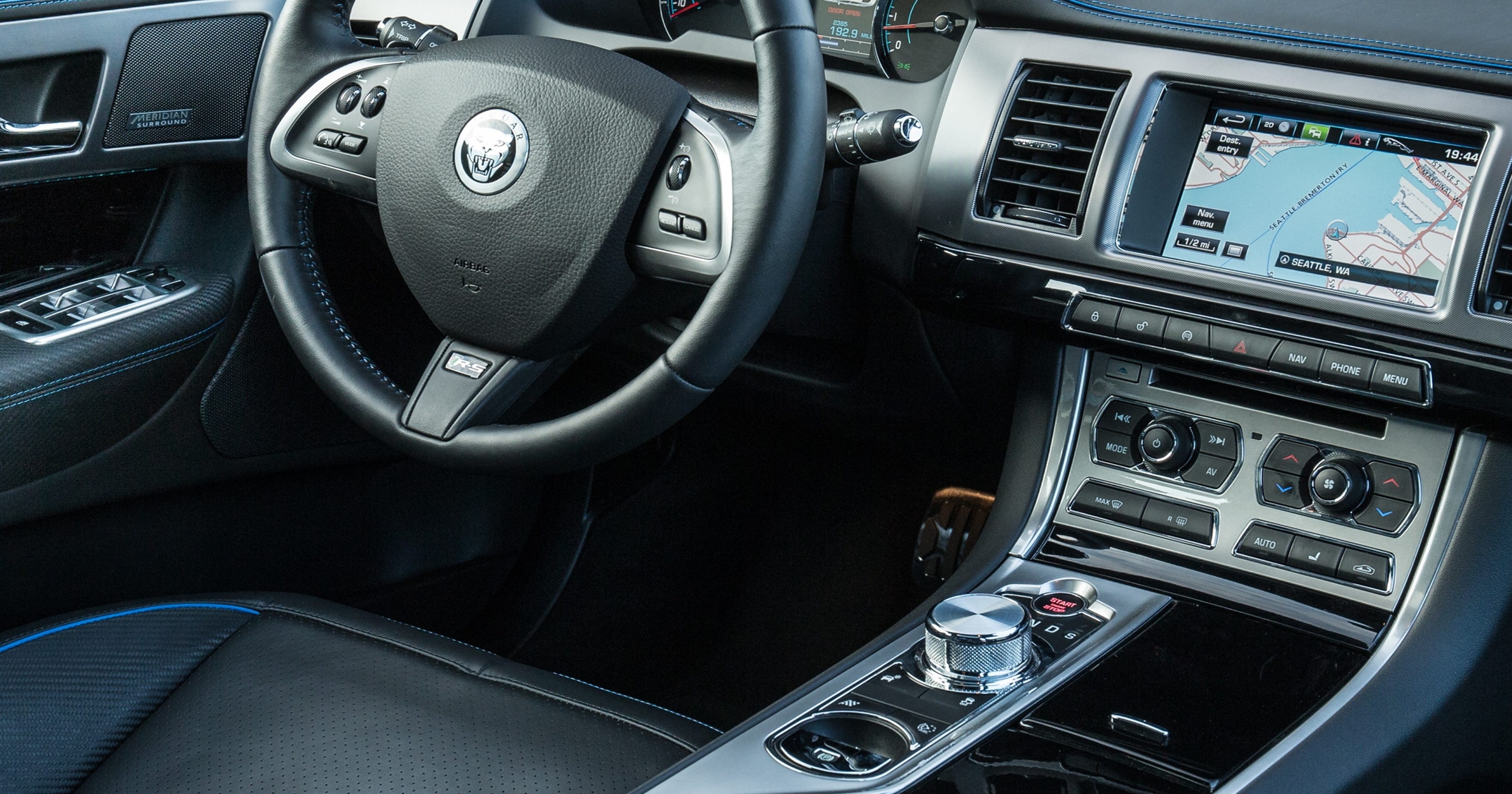 Among bells and whistles, cars shift to buttons, knobs