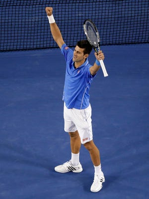 Novak Djokovic celebrates match point Sunday.