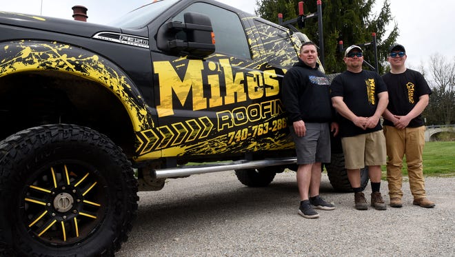 Mike Cullop (center), owner of Mike's Roofing, with brother Nick Cullop and son Mike "Hoss" Cullop. Mike started the business, which does residential and commercial roofing, siding, windows and pole barns, 16 years ago.
