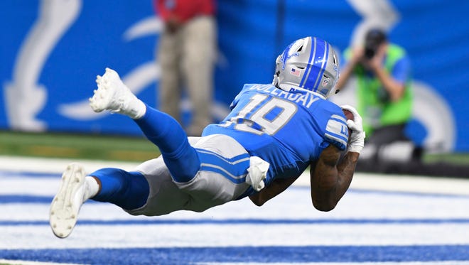 Lions rookie receiver Kenny Golladay makes a diving catch for a 45-yard touchdown against the Cardinals late in the fourth quarter of the Lions' 35-23 win Sunday, Sept. 10, 2017 at Ford Field.