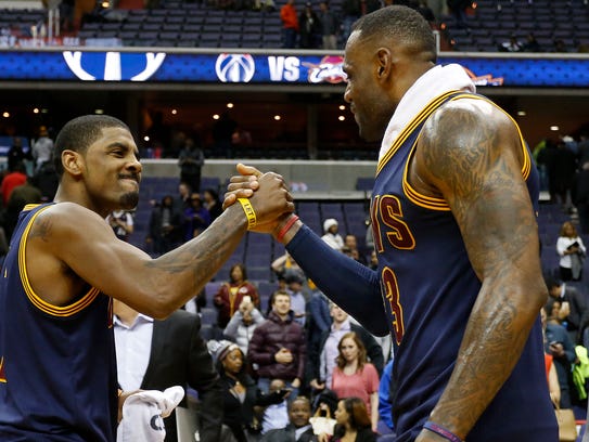 Cleveland Cavaliers guard Kyrie Irving celebrates with