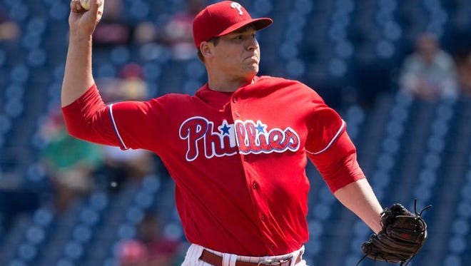 Jerad Eickhoff tied a Phillies' record with seven straight strikeouts in making his first MLB start in 394 days.