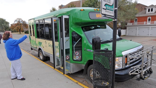 A bus with OCCK Transportation departs from a stop in Salina. The public transit organization announced it is joined the Transit mobile app to give riders information and options as they find how to get to their destination.