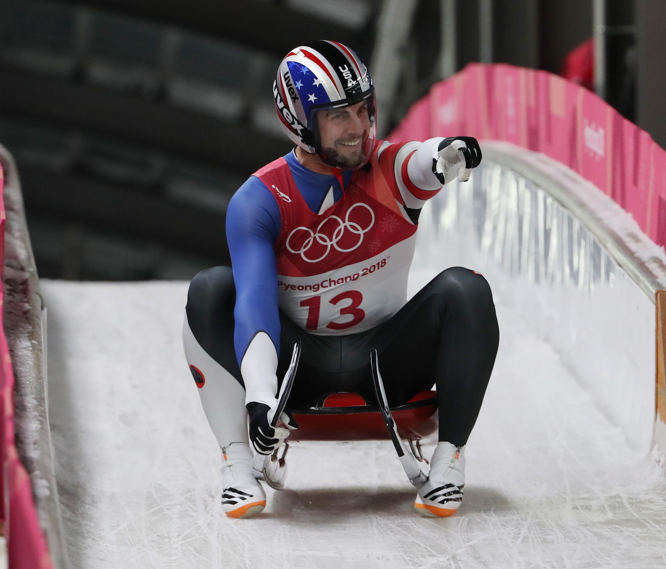 Chris Mazdzer of the USA sets a track record and put himself in silver-medal position with his third luge run on Sunday in the Pyeongchang 2018 Winter Olympics.
