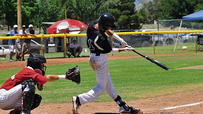 Jaime Guzman/For the Sun-News 
 O&#241;ate's Fabian Reyes makes contact for a hit during Saturday's 40th Annual Bob Ogas North/South Baseball All-Star Classic at Apodaca Park.