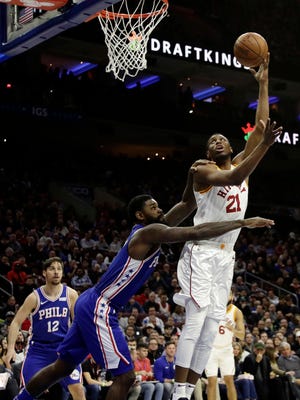 Indiana Pacers' Thaddeus Young, right, goes up for a shot against Philadelphia 76ers' Amir Johnson during the first half of an NBA basketball game, Tuesday, March 13, 2018, in Philadelphia.
